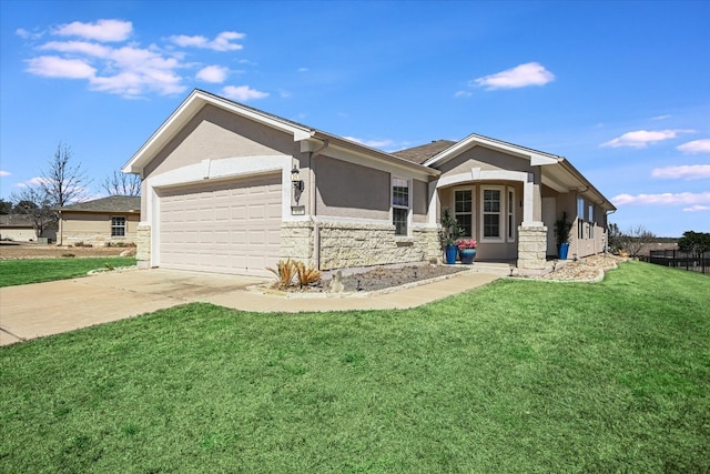 view of front of home with stucco siding, driveway, stone siding, a front yard, and a garage