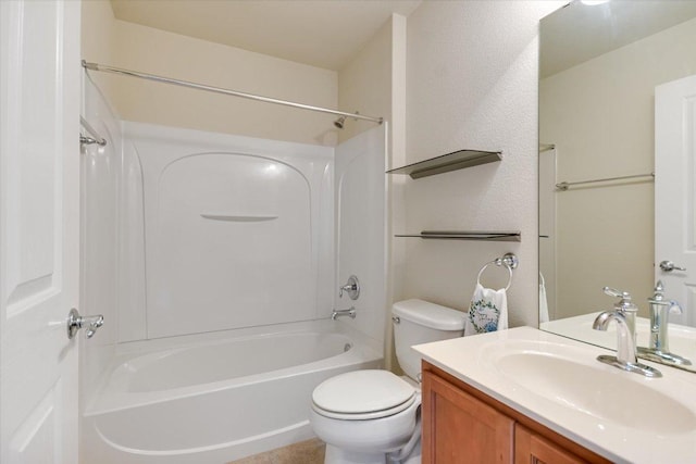 bathroom featuring shower / washtub combination, toilet, and vanity