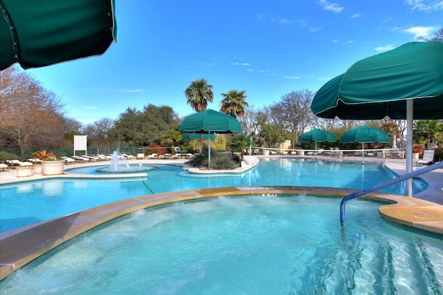 pool with a community hot tub