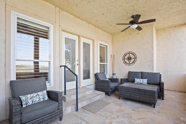 view of patio featuring french doors and a ceiling fan