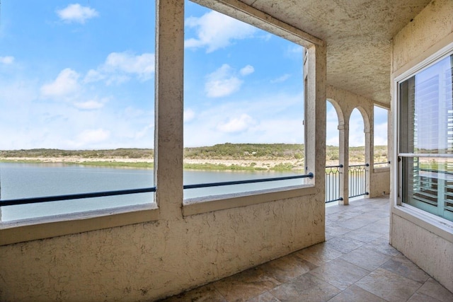 interior space with a water view