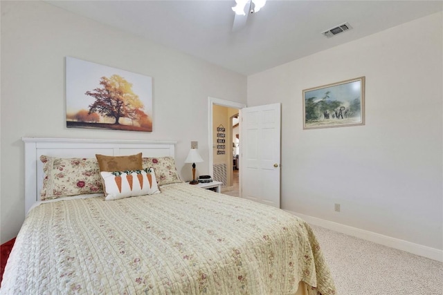 bedroom featuring visible vents, carpet, and baseboards