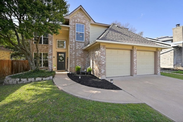 traditional-style house with brick siding, fence, concrete driveway, roof with shingles, and an attached garage