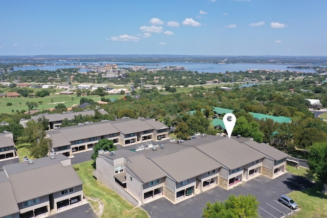 drone / aerial view with a water view