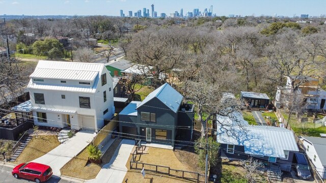 drone / aerial view featuring a city view