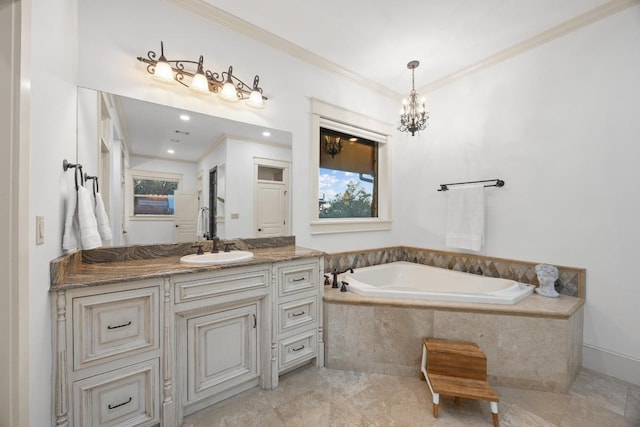 bathroom with a chandelier, a bath, vanity, and ornamental molding