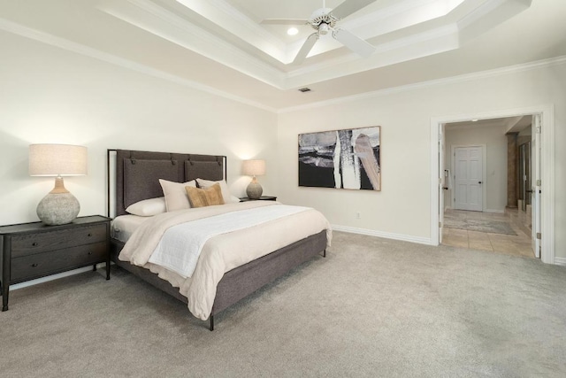 carpeted bedroom with ceiling fan, baseboards, a tray ceiling, ornamental molding, and recessed lighting