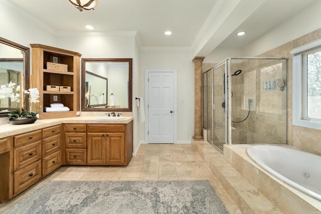 bathroom with vanity, crown molding, a bath, and a stall shower