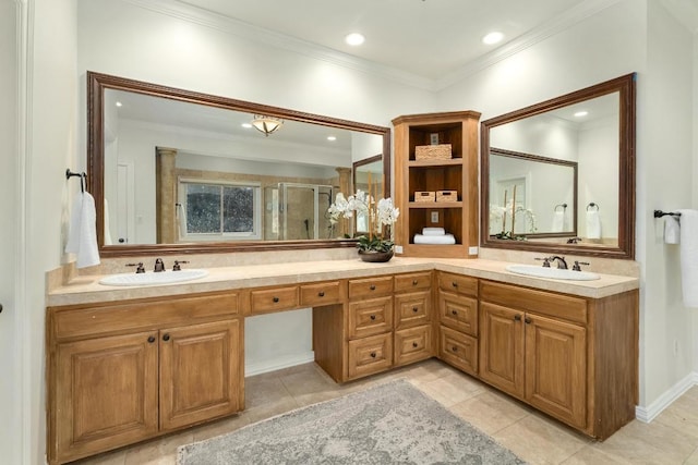 bathroom featuring a sink, a stall shower, double vanity, and ornamental molding