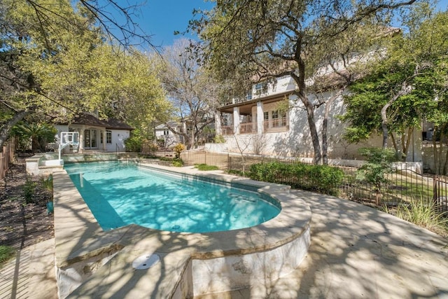 view of pool with a patio, fence, and a fenced in pool