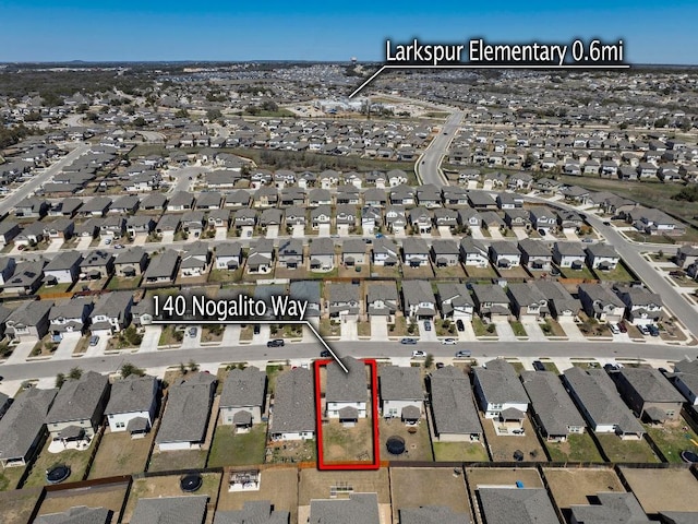 birds eye view of property featuring a residential view