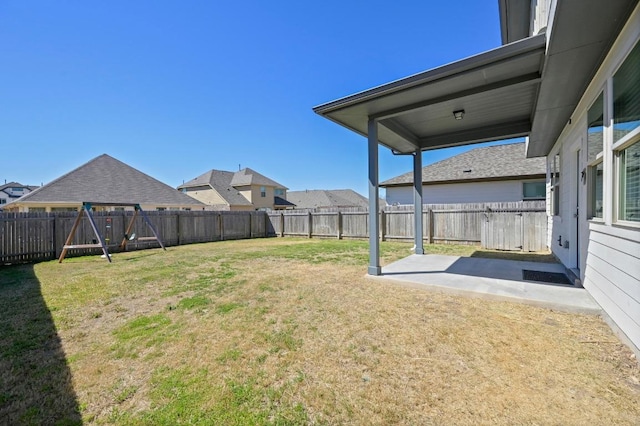 view of yard featuring a patio and a fenced backyard