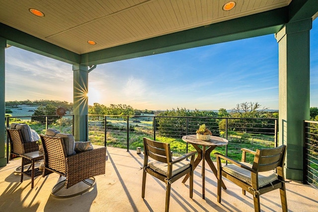 view of patio / terrace with a balcony