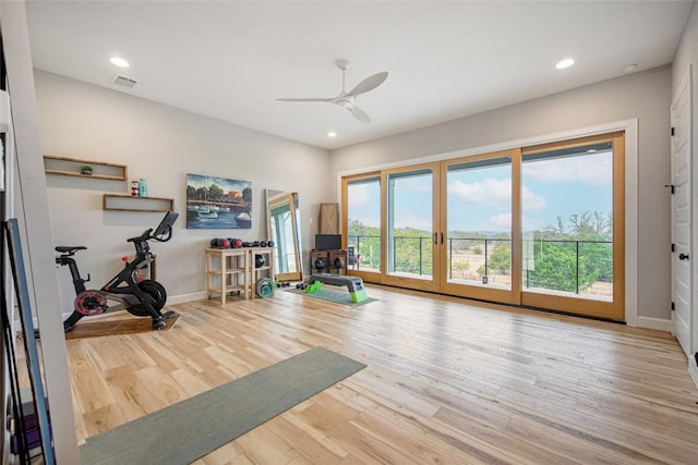 exercise room with visible vents, a ceiling fan, wood finished floors, recessed lighting, and baseboards