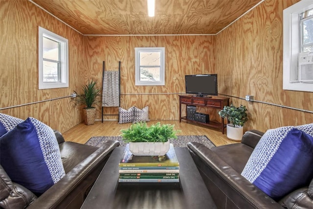 living room with wood finished floors and wooden ceiling