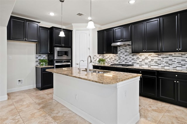 kitchen featuring under cabinet range hood, visible vents, dark cabinets, and appliances with stainless steel finishes