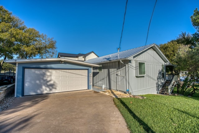 exterior space with concrete driveway