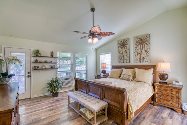 bedroom with baseboards, wood finished floors, a ceiling fan, and vaulted ceiling