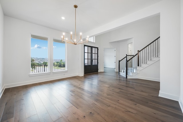 1821 Novara Trl, Leander, TX 78641 - foyer featuring a chandelier, stairway, baseboards, dark wood-style flooring, and recessed lighting