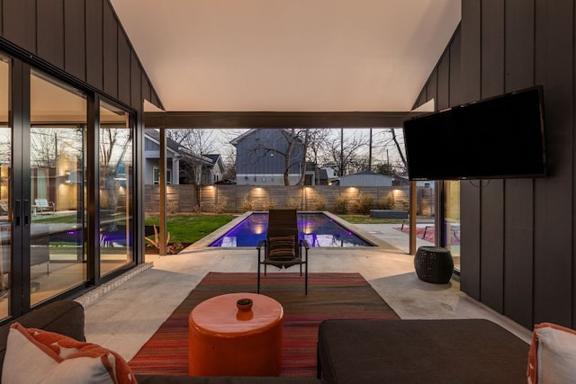 view of swimming pool with a fenced backyard, a fenced in pool, and a patio