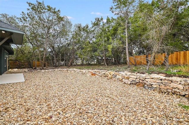 view of yard with fence