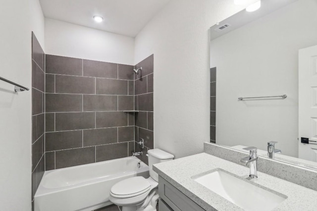 full bathroom featuring vanity, toilet, tub / shower combination, and visible vents