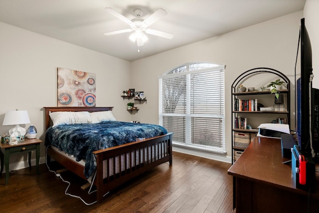 bedroom with ceiling fan and wood finished floors