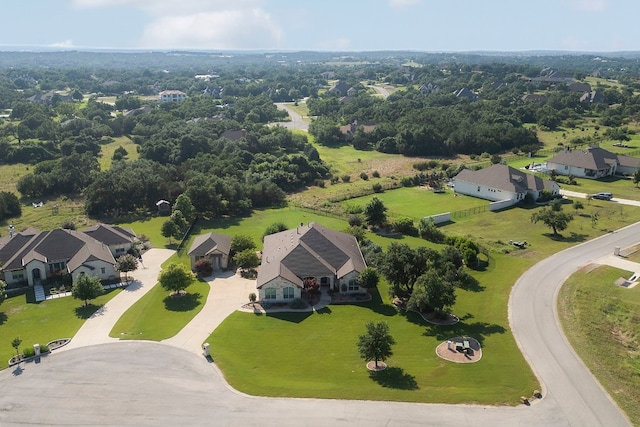 birds eye view of property with a residential view