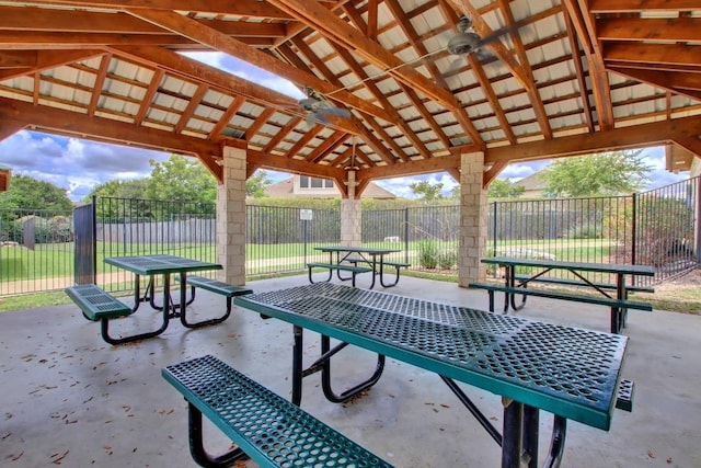 view of property's community with a patio and fence