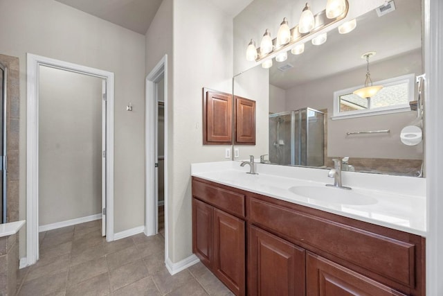 full bathroom with double vanity, visible vents, a stall shower, and a sink