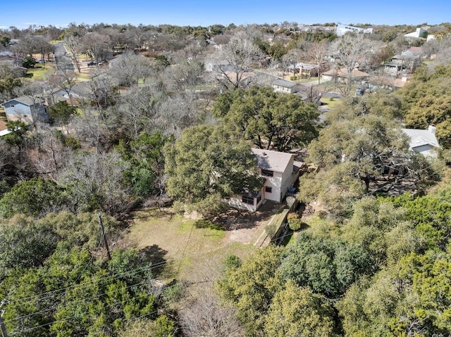 bird's eye view featuring a forest view