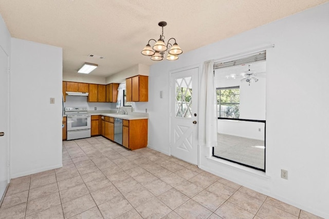 kitchen featuring white range with electric cooktop, under cabinet range hood, light countertops, brown cabinetry, and stainless steel dishwasher