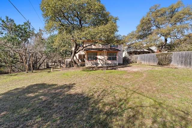 view of yard featuring fence