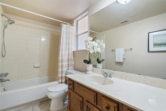 full bath featuring visible vents, shower / bath combination with curtain, a textured ceiling, tile patterned floors, and toilet