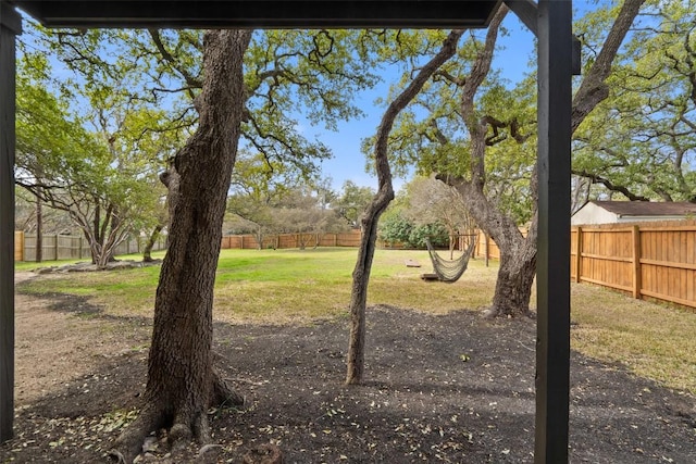 view of yard with a fenced backyard