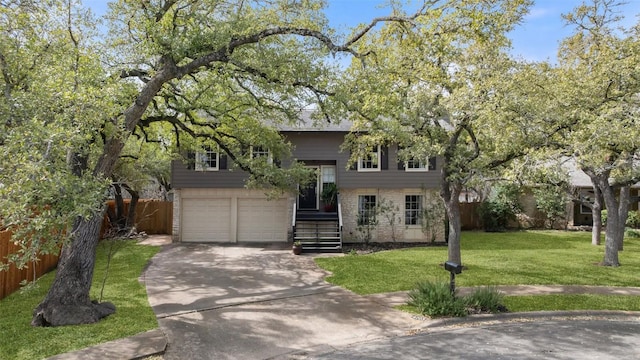 4703 White Elm Ct, Austin, TX 78749 - view of front of home with concrete driveway, brick siding, and an attached garage