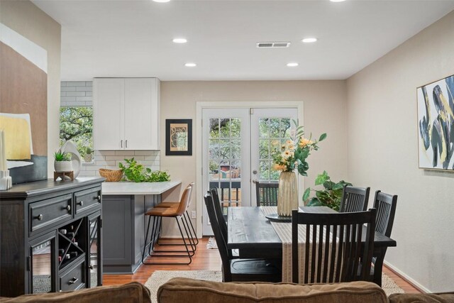 4703 White Elm Ct, Austin, TX 78749 - dining space with light wood-style floors and recessed lighting