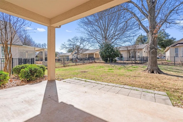 view of patio / terrace with a residential view and fence