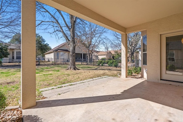 view of patio / terrace featuring fence