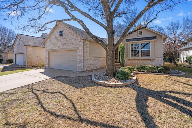 view of front of home with a front yard, an attached garage, stucco siding, concrete driveway, and stone siding