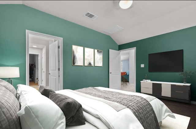 bedroom featuring visible vents and lofted ceiling