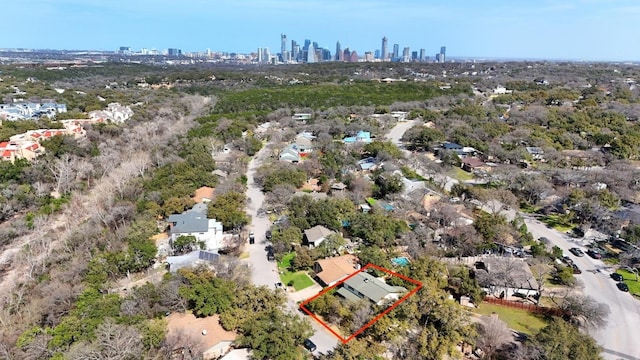 birds eye view of property featuring a city view