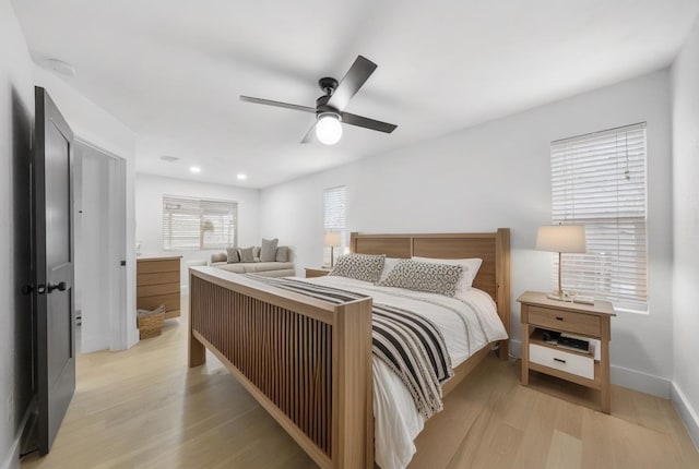 bedroom featuring recessed lighting, ceiling fan, baseboards, and light wood-style floors