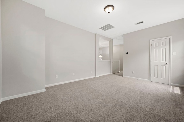 unfurnished bedroom featuring visible vents, baseboards, and carpet floors