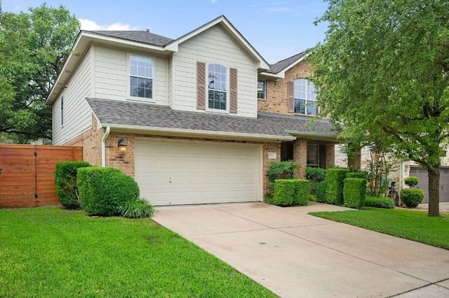 view of front of house featuring a garage, a front lawn, brick siding, and driveway