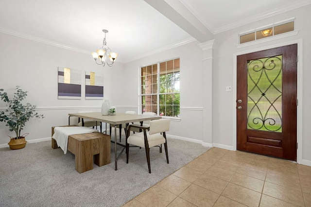 dining space with light colored carpet, an inviting chandelier, ornamental molding, and light tile patterned flooring