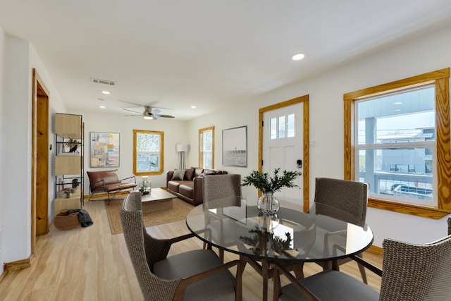 dining area featuring recessed lighting, visible vents, plenty of natural light, and light wood-style floors