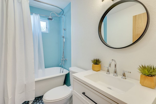 bathroom with vanity, toilet, and shower / bath combo