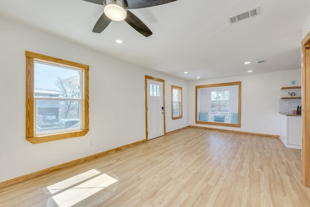 unfurnished living room with visible vents, baseboards, light wood-type flooring, recessed lighting, and a ceiling fan