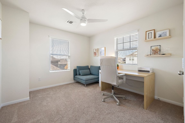 102 Tokalaun Dr, Hutto, TX 78634 - carpeted home office featuring ceiling fan and baseboards